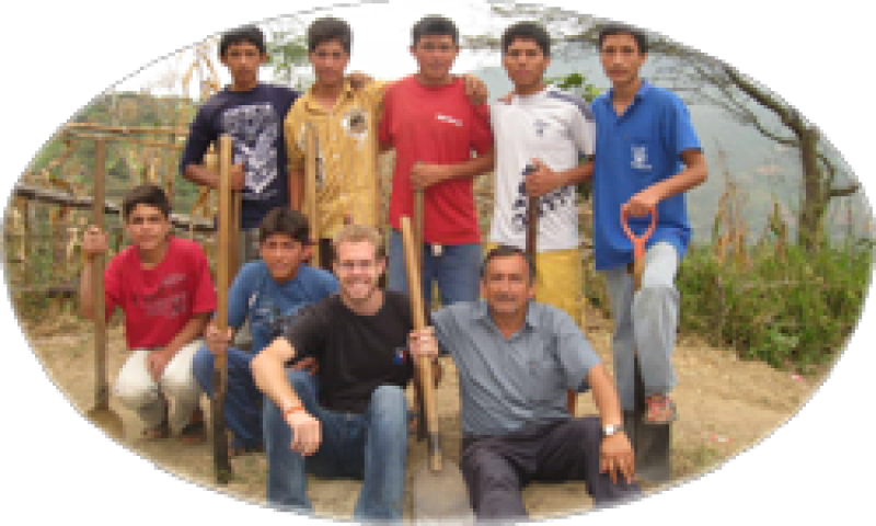 Glenn Stanley with local men in Peru.