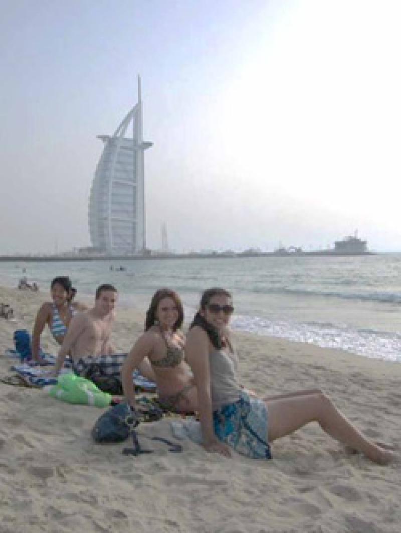 Anya Ursu and friends on a beach near Dubai.