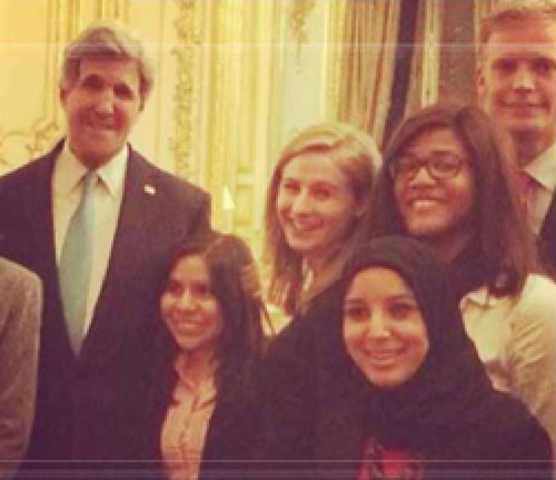 Anna (third from the left, top center) had the opportunity to meet John Kerry during her internship in Paris.
