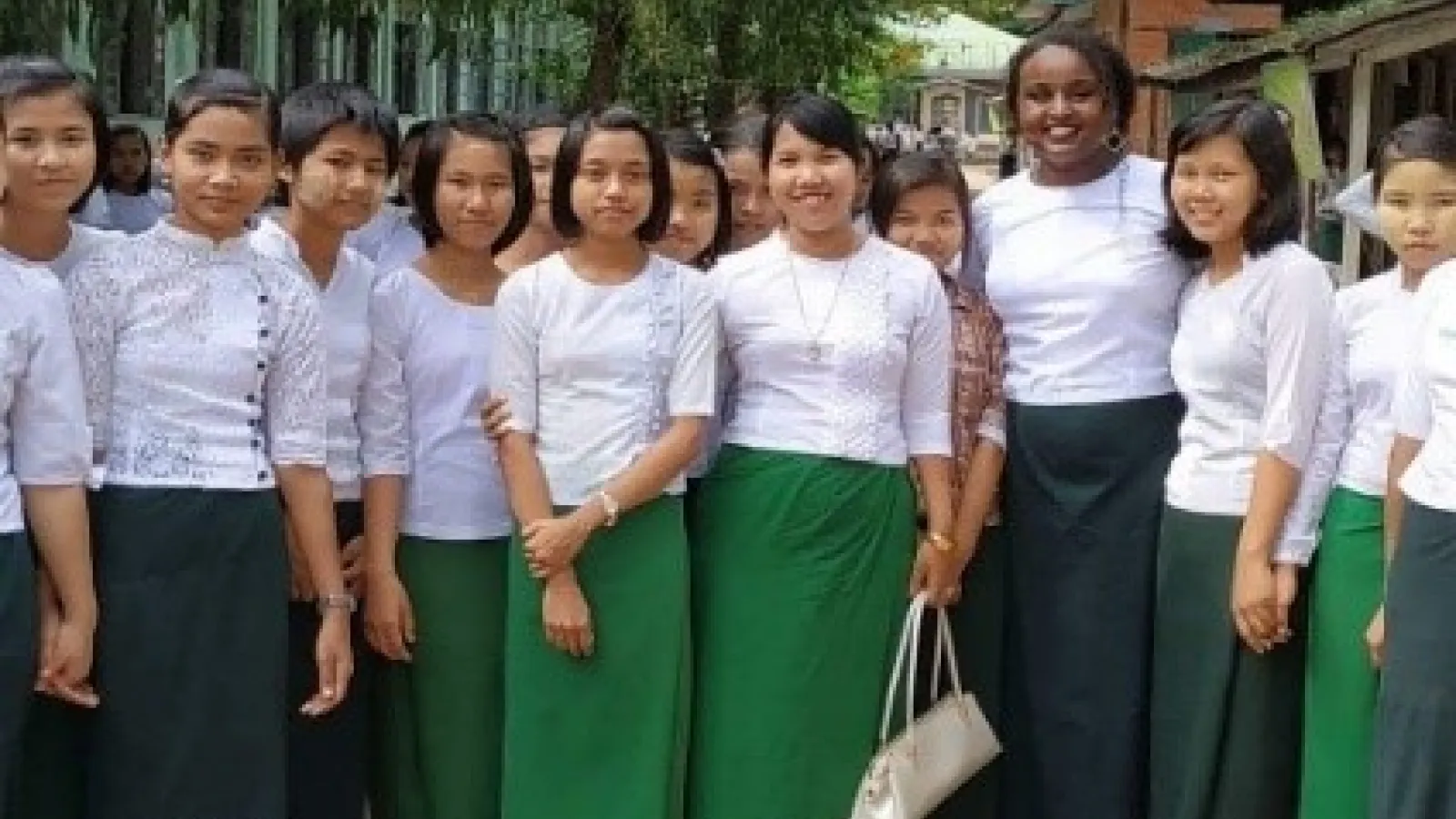 A photograph of Ladan Ibrahim pictured with her students