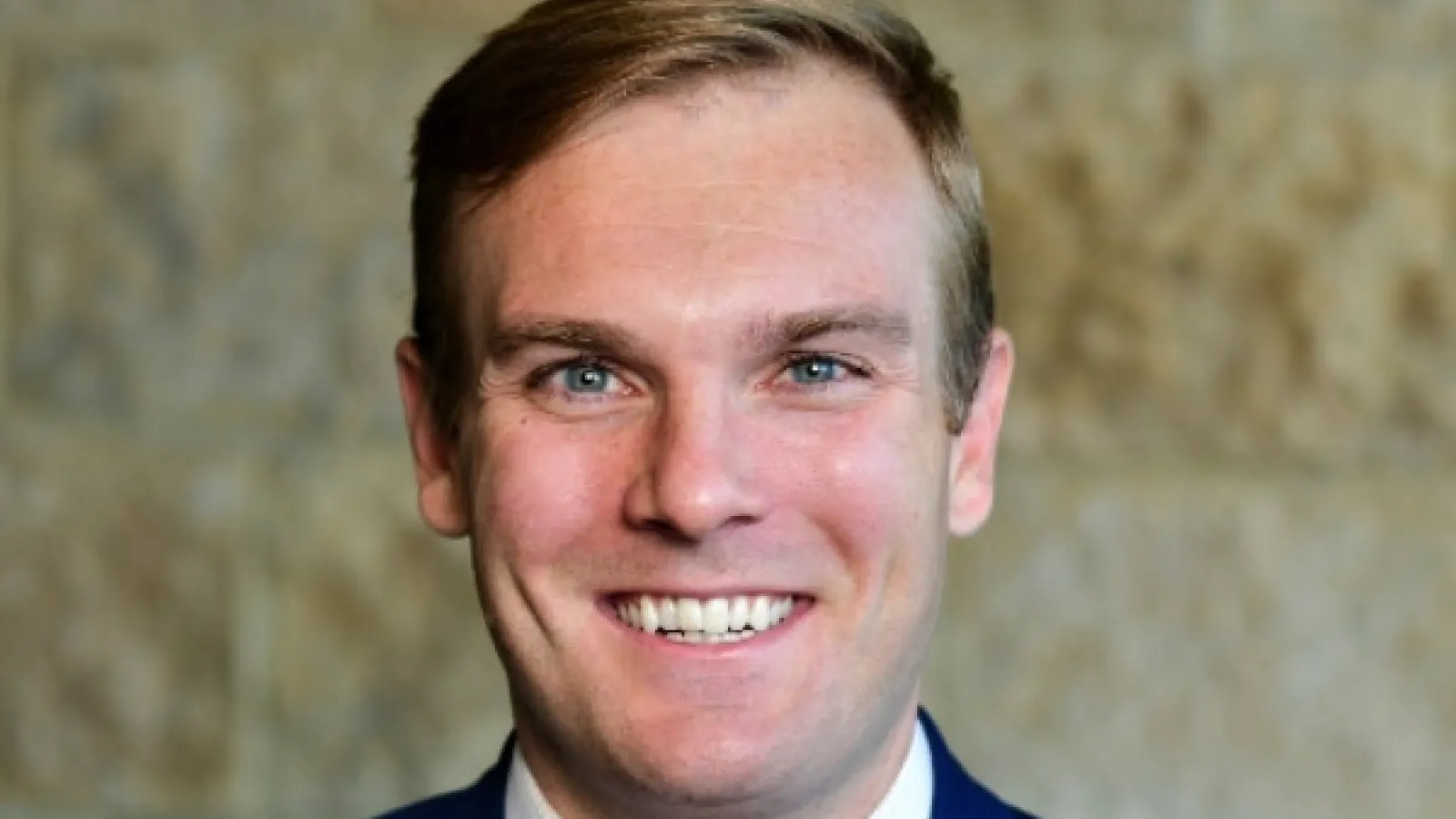 Professional headshot of Andrew Rigney