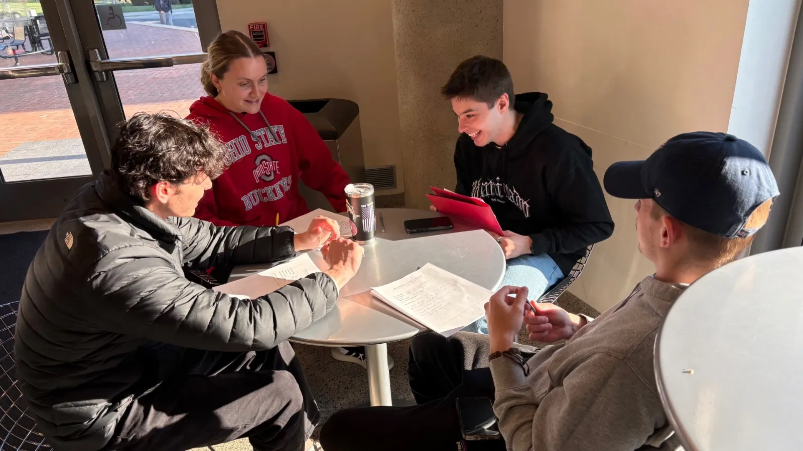 A group of International Studies students working on a project