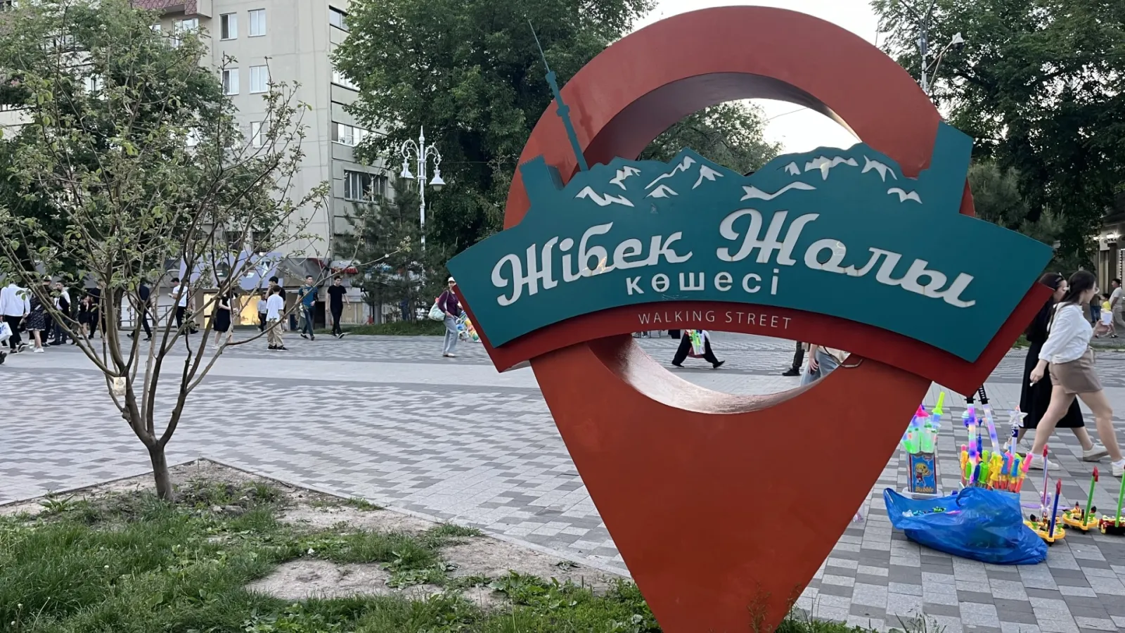 Zhibek Zholy street sign in Almaty, Kazakhstan