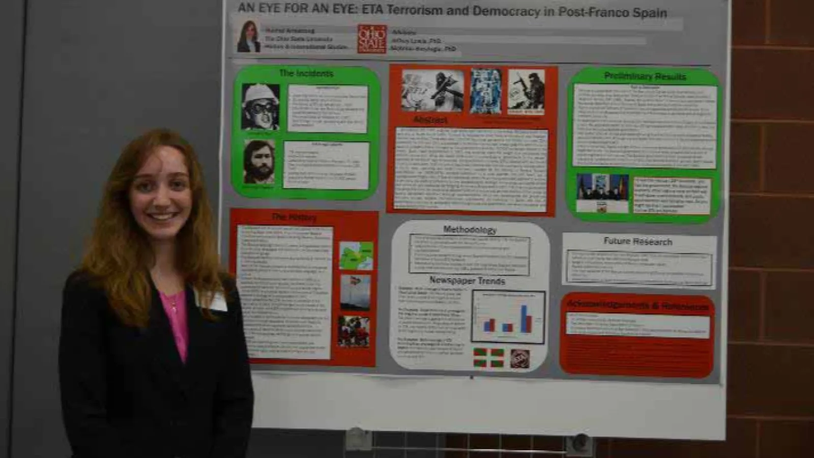 Rachel Armstrong in front of her Denman Forum presentation.