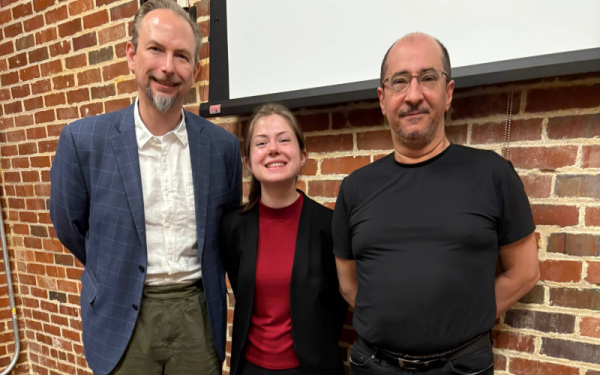 Two professors and a student smiling