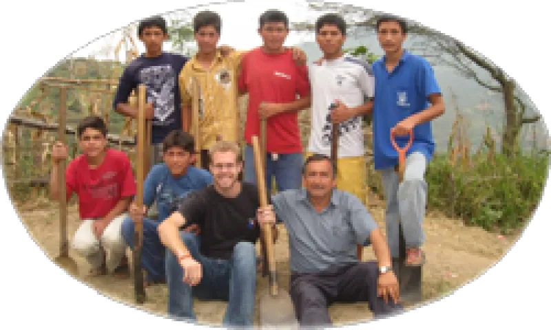 Glenn Stanley with local men in Peru.