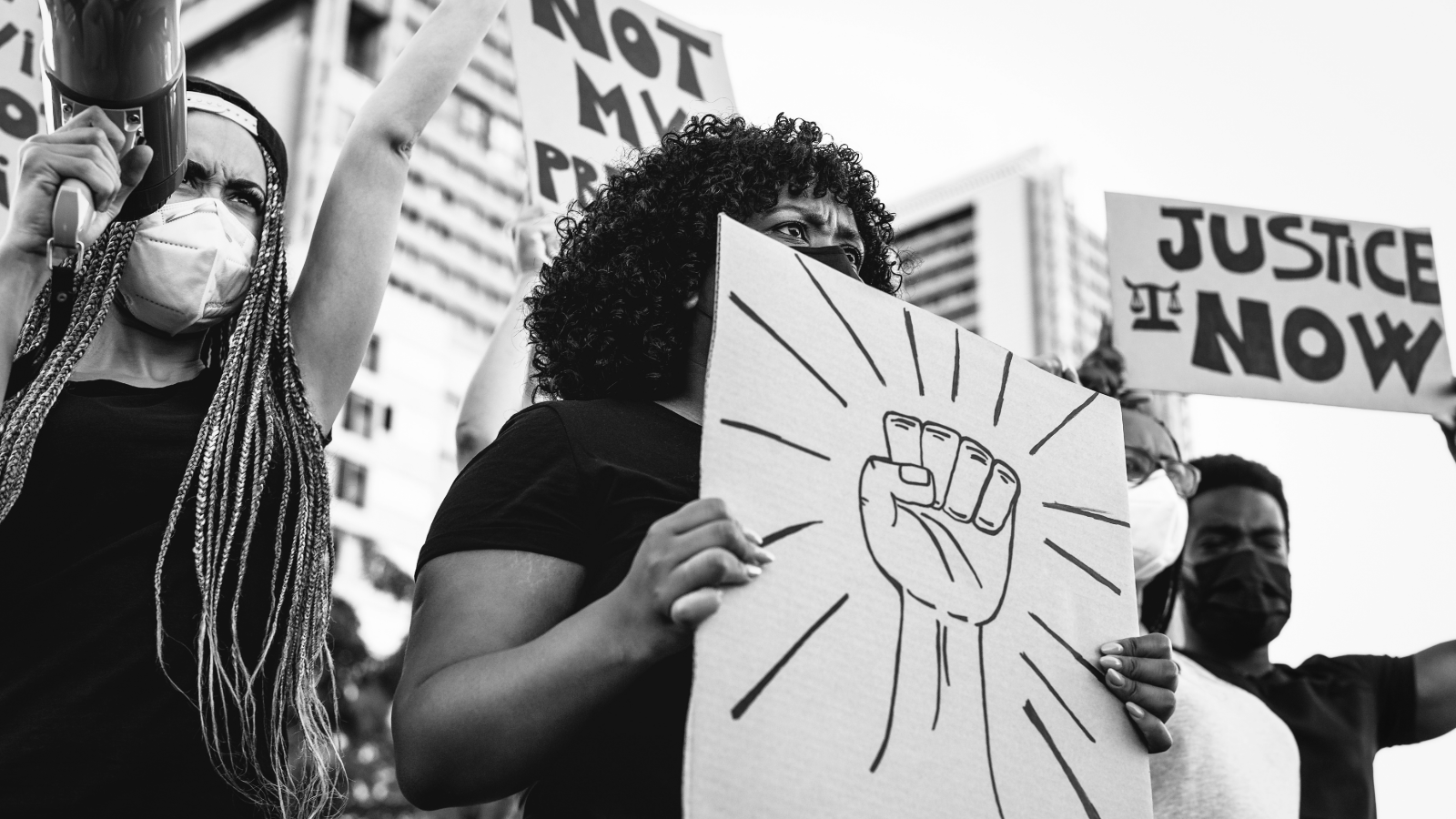 A black and white photo of Black Lives Matter protesters