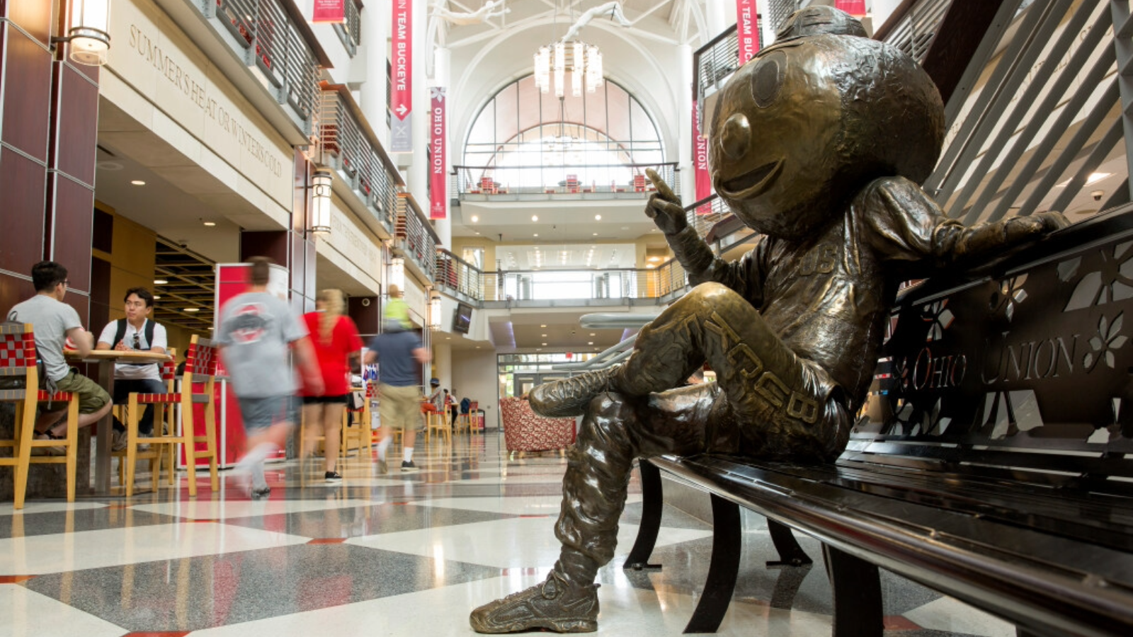 A bronze statue of Brutus Buckeye in the Ohio Union