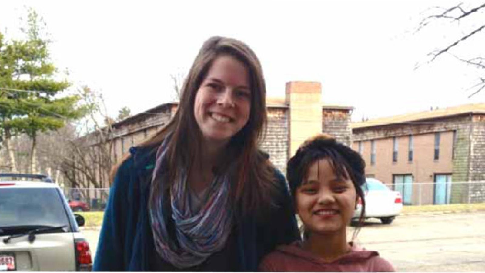 Margaret Clemens with local child in Nepal.