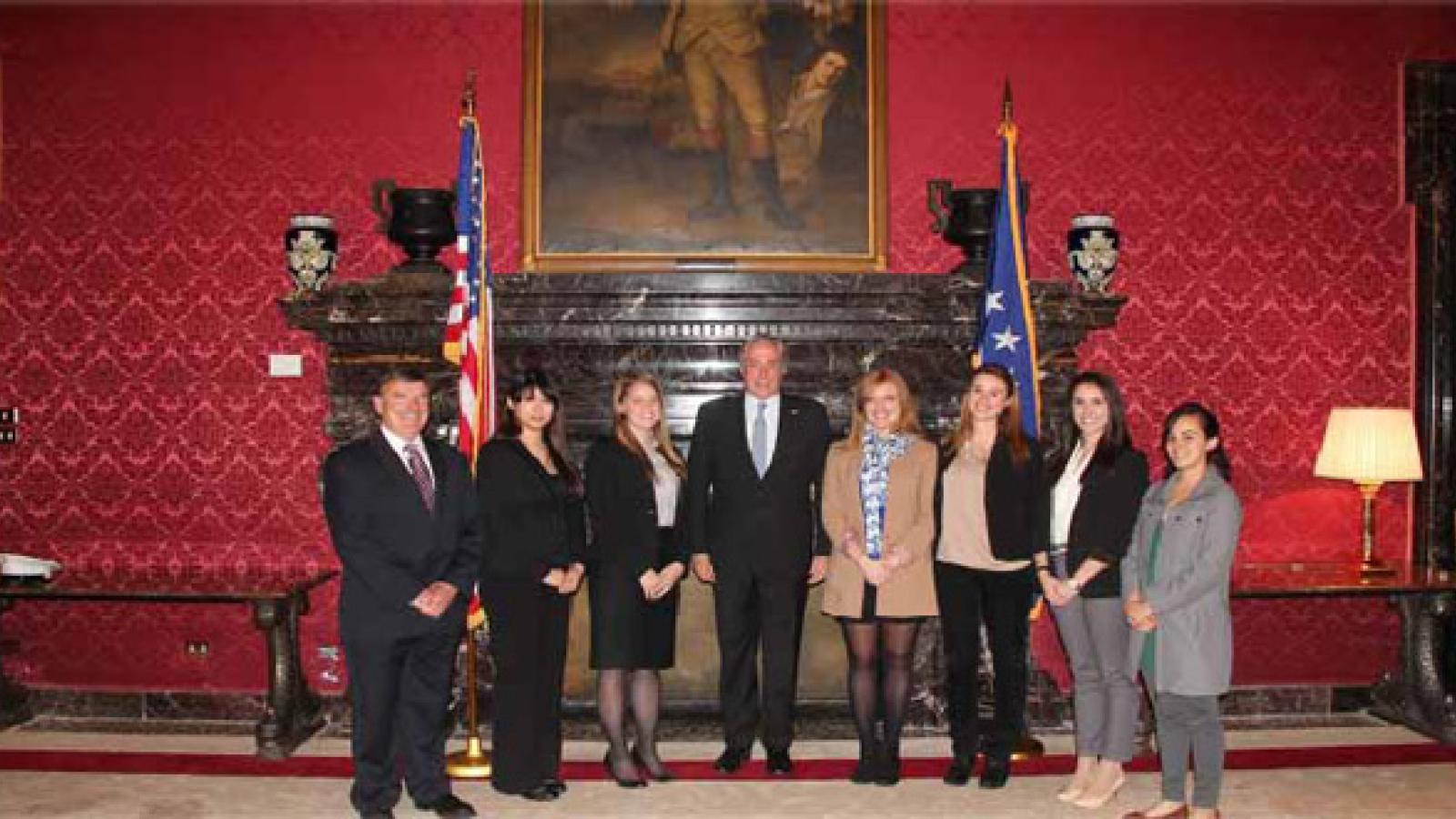 Kaitlin Cutshaw poses for photo with the U.S. Ambassador, staff and interns at the U.S. Embassy in Rome.