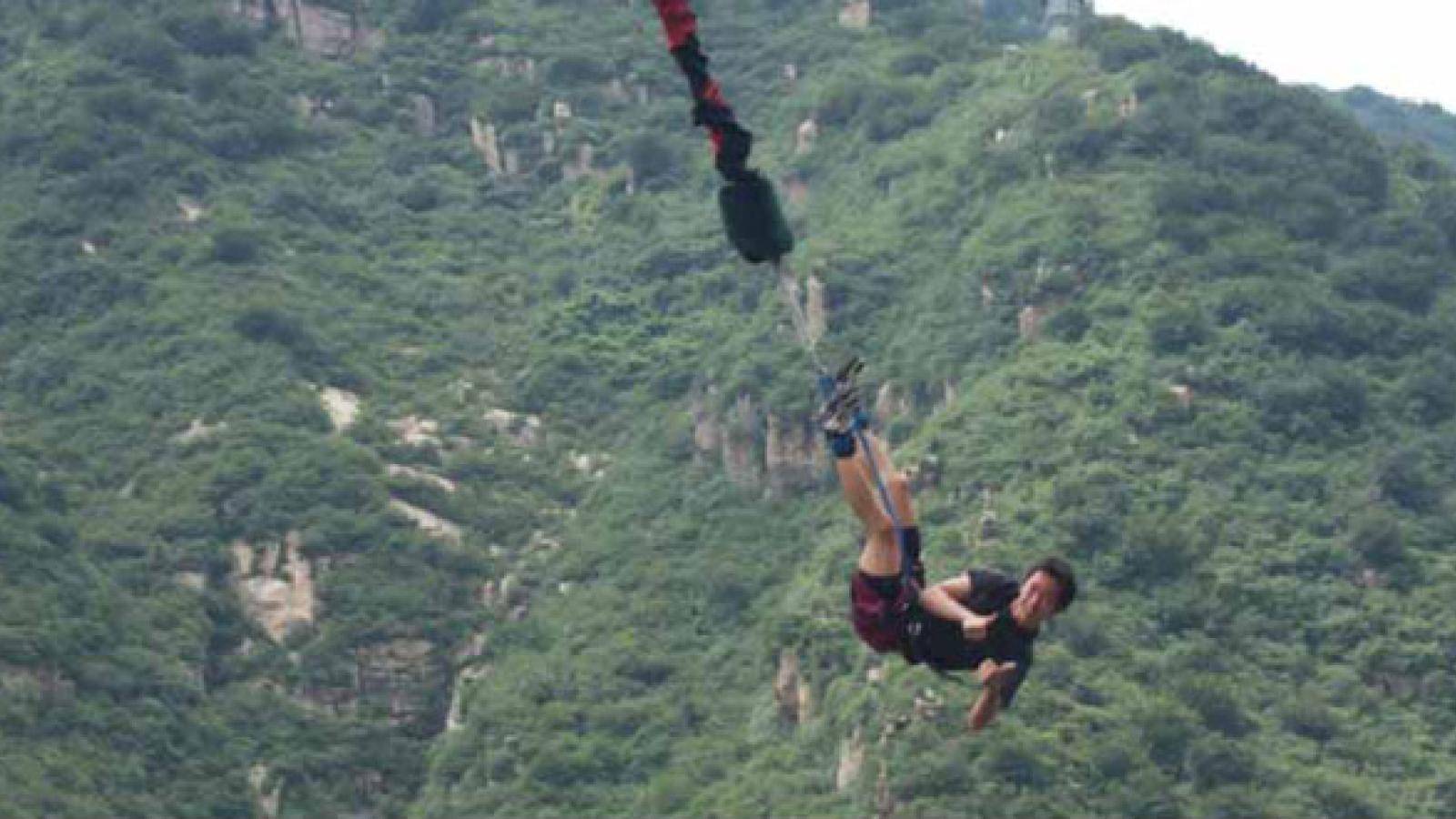 Adam Kong bungee jumping in China.